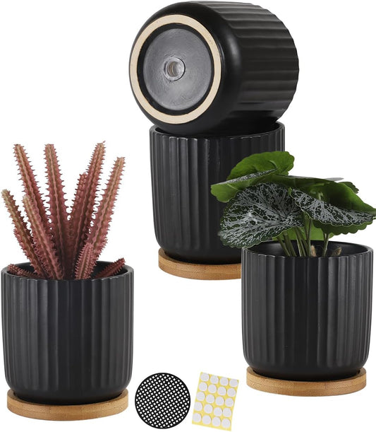 TAMAYKIM 4 Inch Small Cylinder Ceramic Plant Pots with Drainage Holes, Modern Indoor Planters with Tray for Aloe, Succulent, Snake Plants, Cactus & Herbs, Black, Set of 4